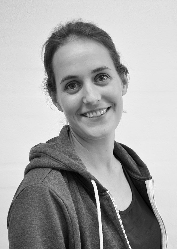 Black-and-white portrait of designer Amalie Skov Rahbaek.