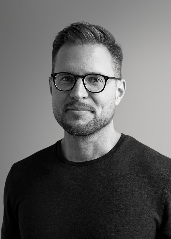 Black-and-white portrait of designer Andreas Kowaleski.