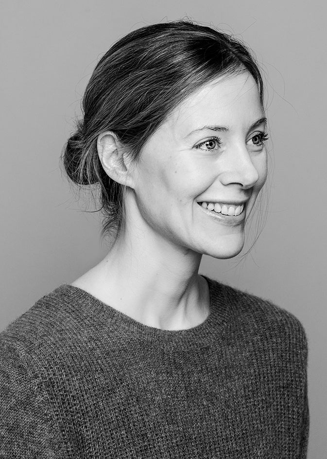 Black-and-white portrait of designer Christine Rathmann.