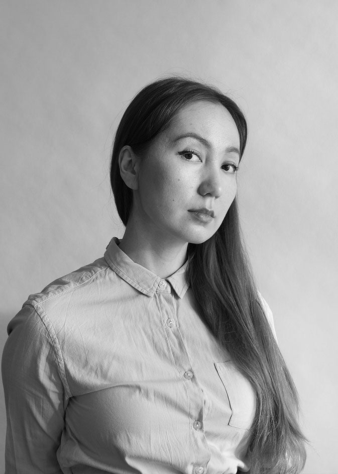 Black-and-white portrait of designer Ella Shegai.