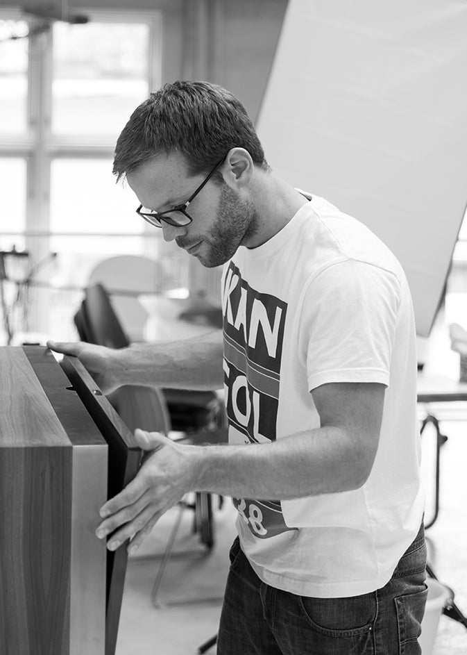 Designer Frederik Kurzweg assembling a design.