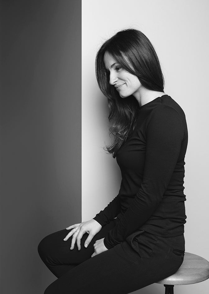 Black-and-white portrait of designer Hanne Willmann.