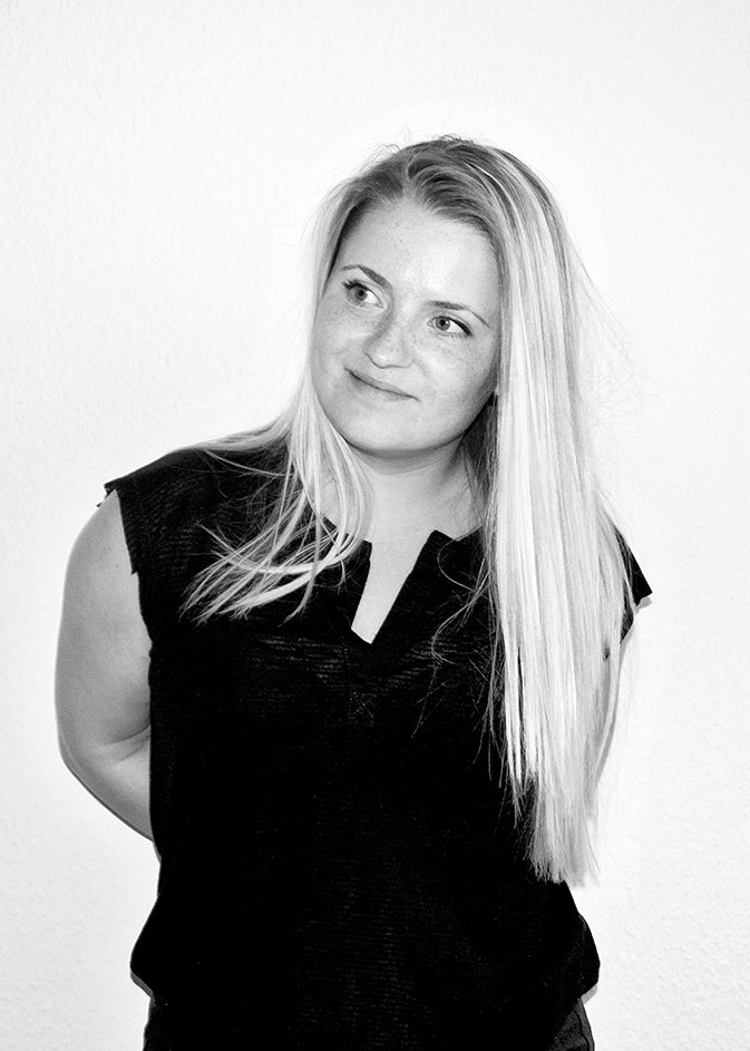 Black-and-white portrait of designer Jeanette Holdgaard.