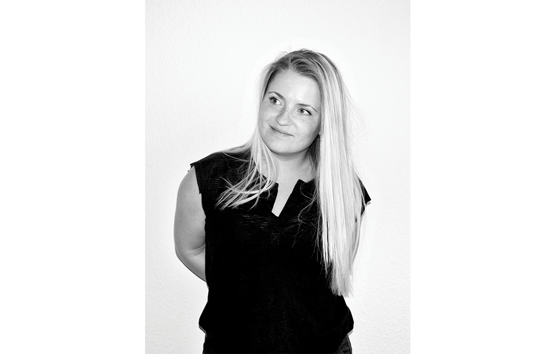 Black-and-white portrait of designer Jeanette Holdgaard.