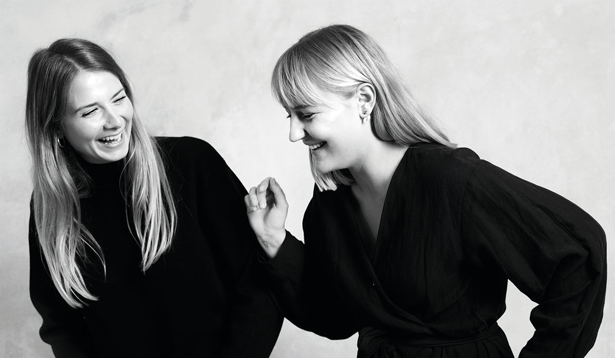 Black-and-white portrait of designers Julie Begtrup and Ditte Vad.
