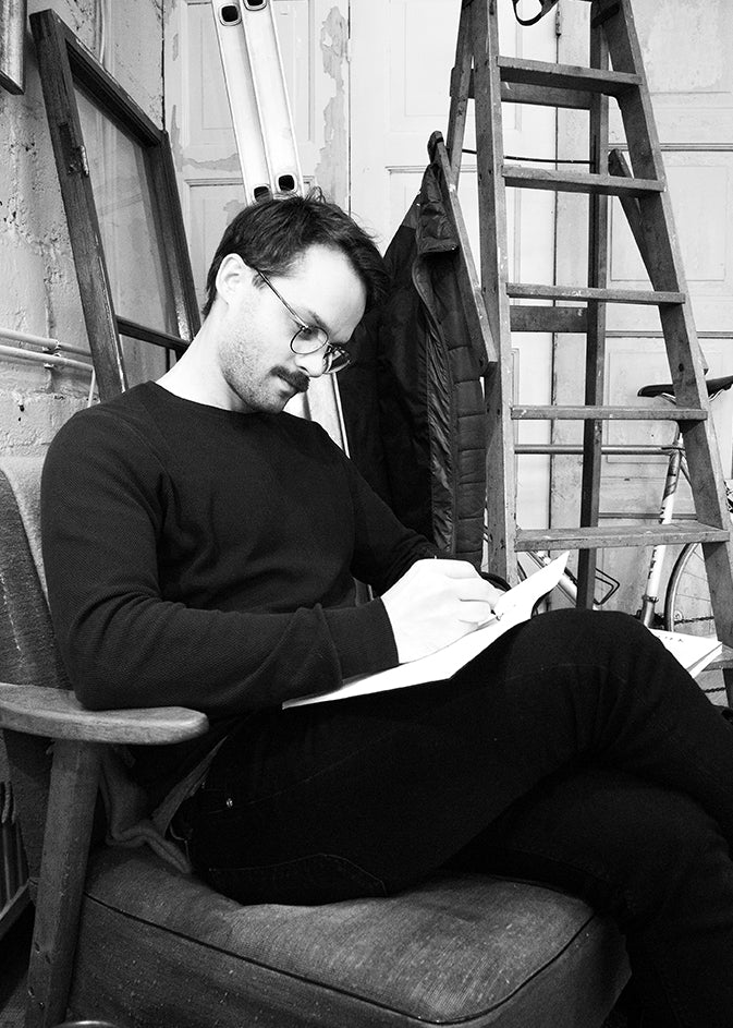 Designer Kasper Nyman sketching creative designs.