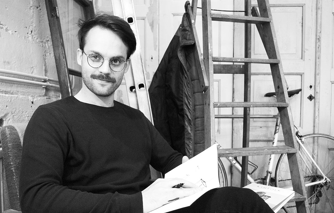 Designer Kasper Nyman sketching creative designs.