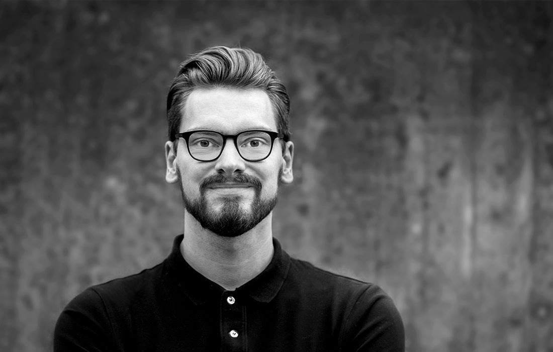 Black-and-white portrait of designer Leonard Aldenhoff.