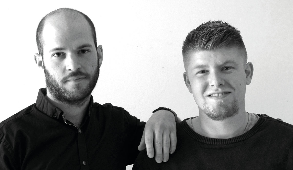 Black-and-white portrait of designers Mark Wedel and Rasmus Røpke, founders of the design studios MOAKK and Røpke Design.