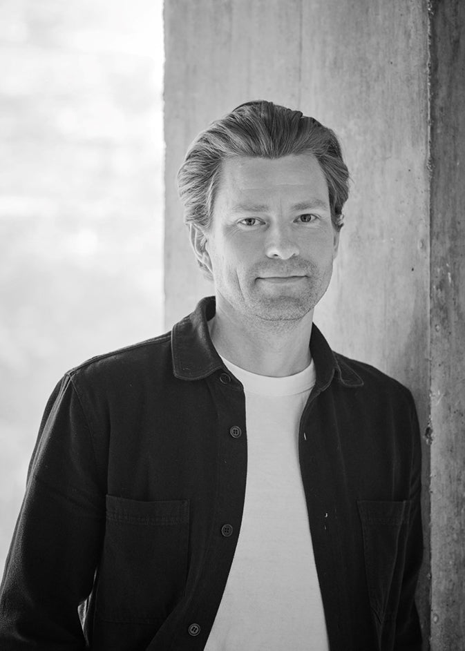 Black-and-white portrait of designer Magnus Pettersen.