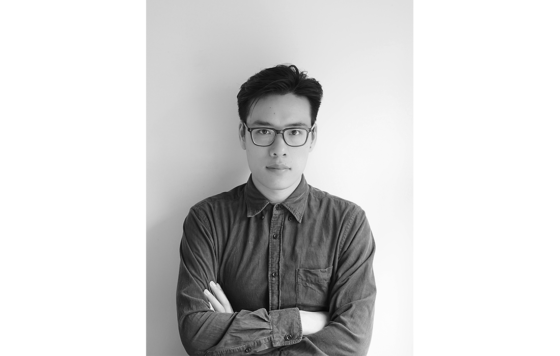 Black-and-white portrait of designer Mario Tsai.