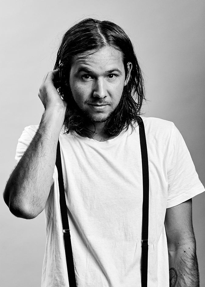 Black-and-white portrait of designer Michael Christensen, founder of Michael Daae Studio.