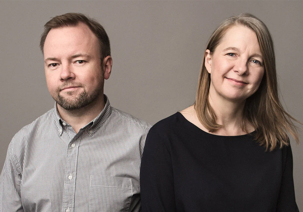 Black-and-white portrait of designer Mika Tolvanen and Julie Tolvanen.