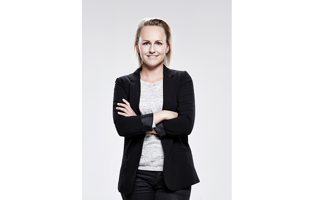 Black-and-white portrait of designer Maja Vindbjerg.