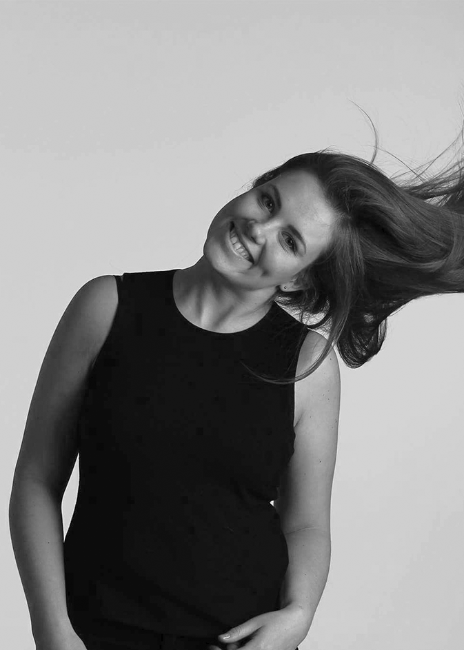 Black-and-white portrait of designer Rikke Palmerston.