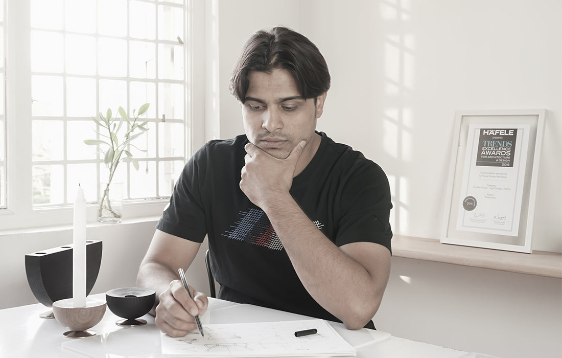 Designer Saif Faisal sketching creative designs.