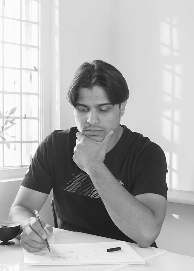Designer Saif Faisal sketching creative designs.