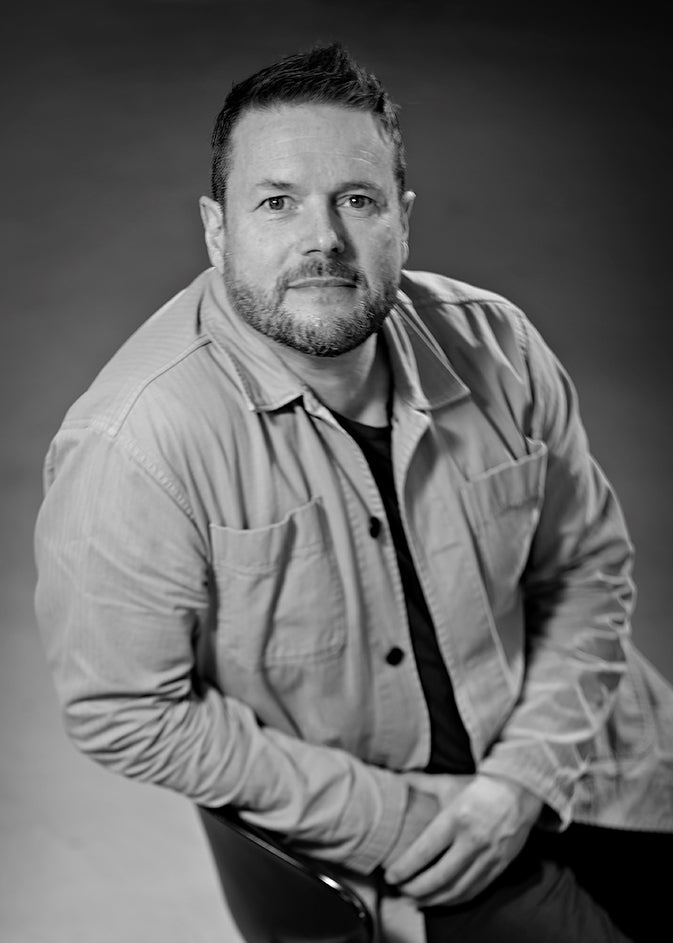 Black-and-white portrait of designer Steffen Juul.