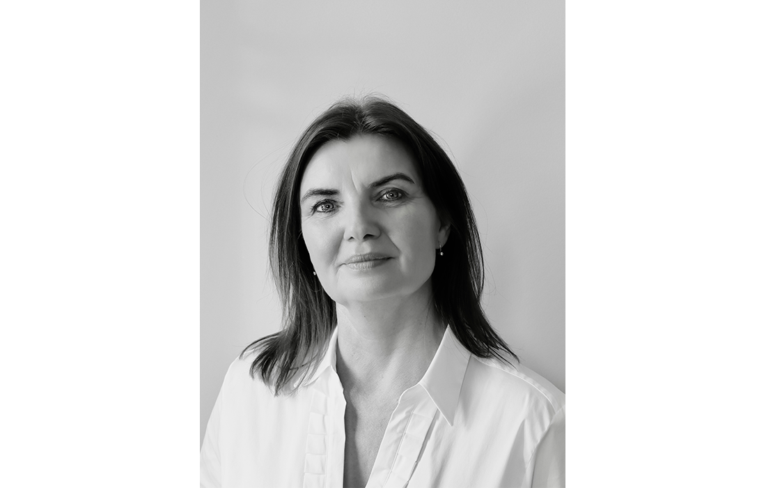 Black-and-white portrait of designer Tina Schmidt.