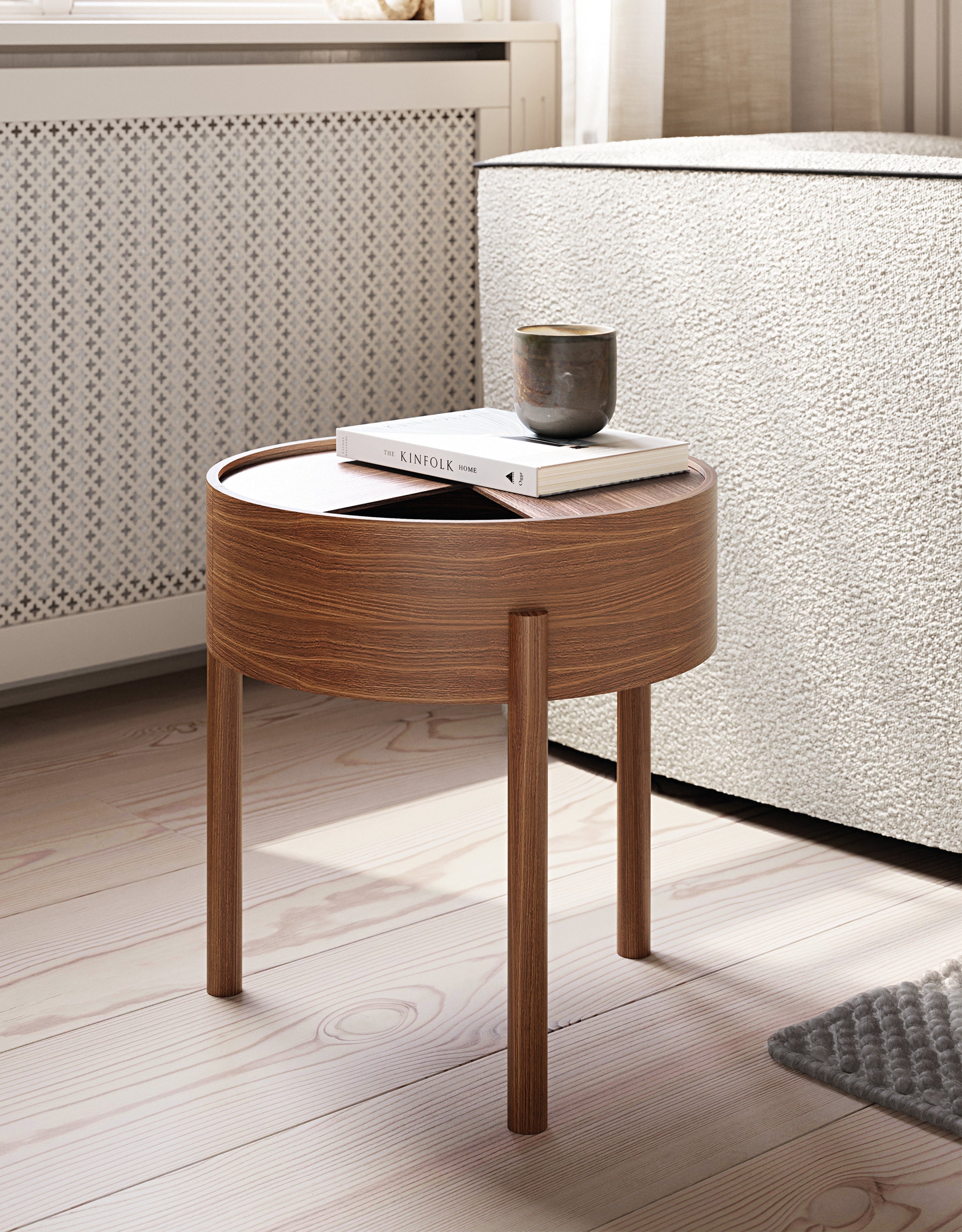 Small walnut side table in minimalist living room.